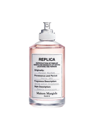 REPLICA perfume by Maison Margiela for women - elegant fragrance bottle